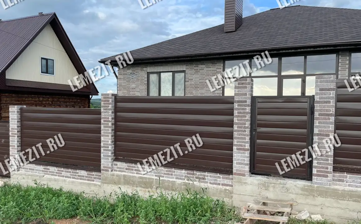 облицовка забора и фасада каменныйм кирпичом из лемезита